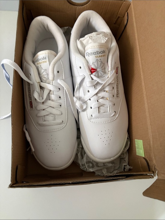 Reebok Shoes - Reebok White Low-Top Leather Sneakers with Subtle Red Accent